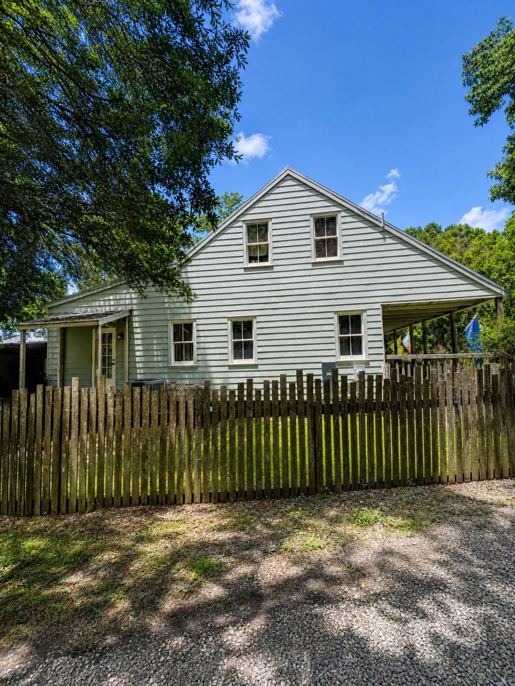 Same house siding bright and clean after soft washing