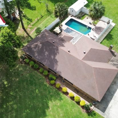 Aerial view of the same roof clean and even after soft washing
